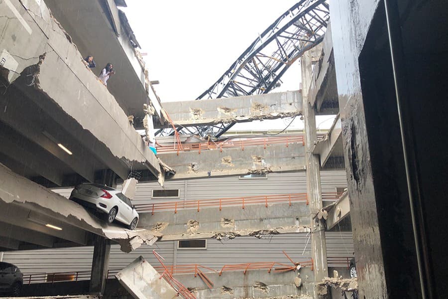 Crane collapses on Dallas apartment building, killing one, injuring six