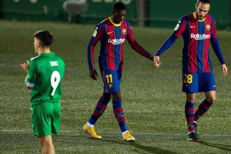 Barca misses two penalties before edging past Cornella in extra-time