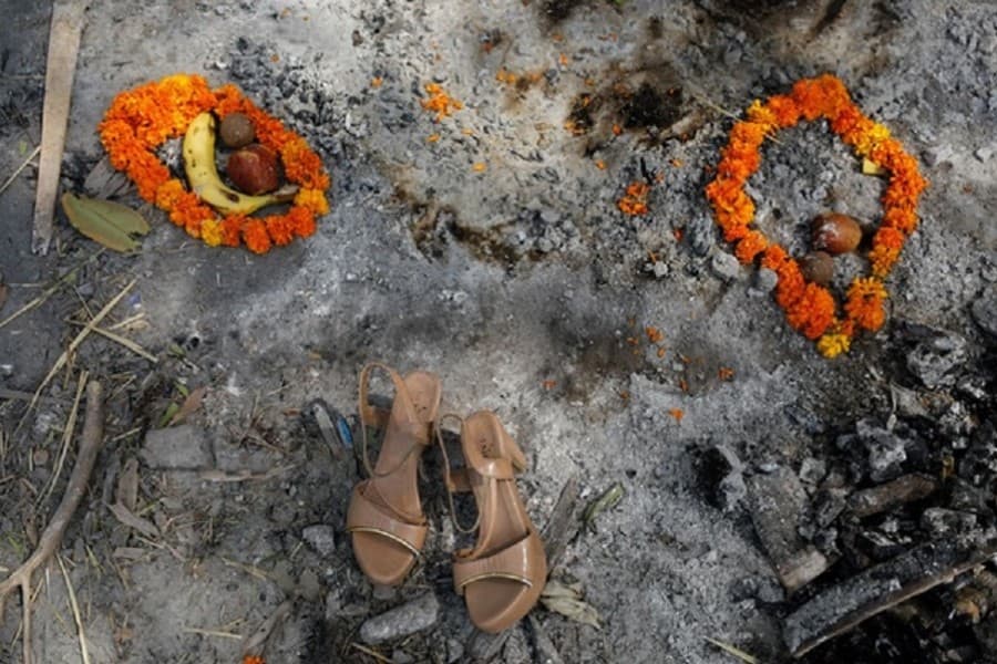 India's virus deaths jump by record 3,689