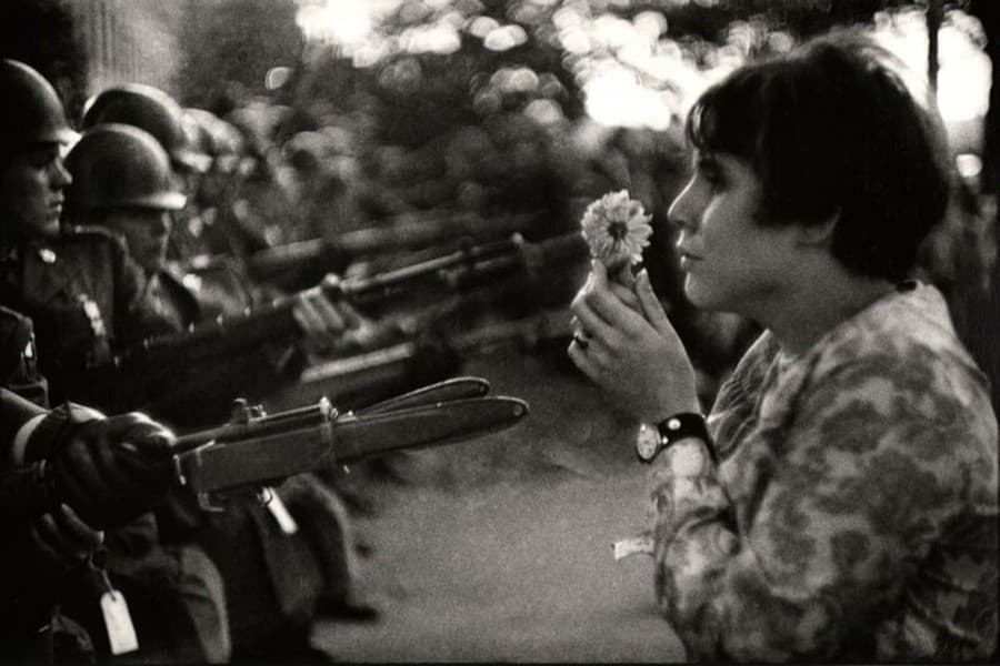 Offering flowers to police: The history of using flowers in protest
