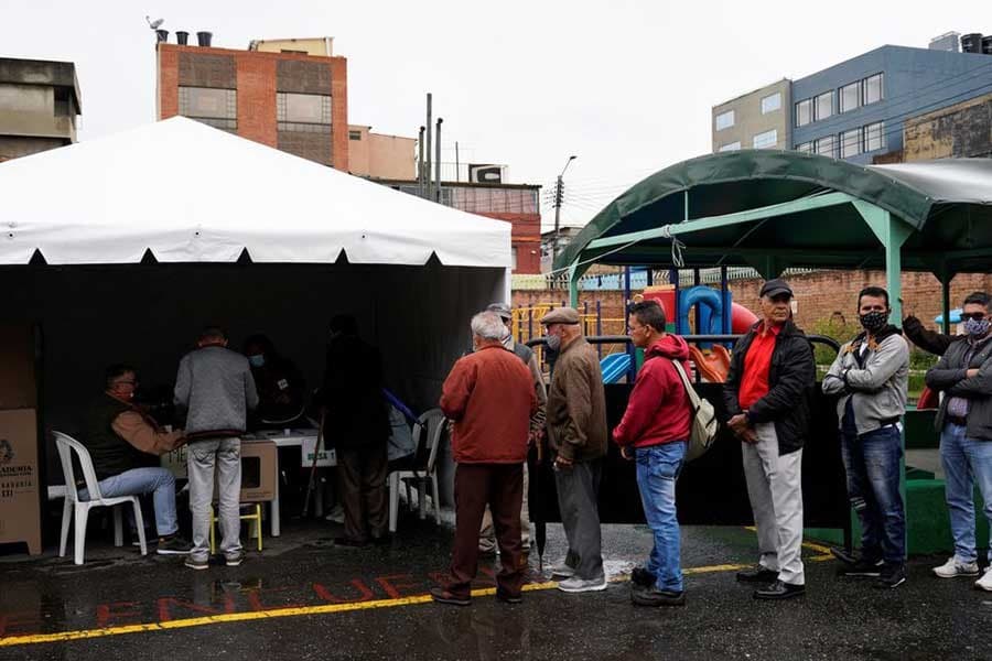 Colombians head to polls in a divisive presidential election